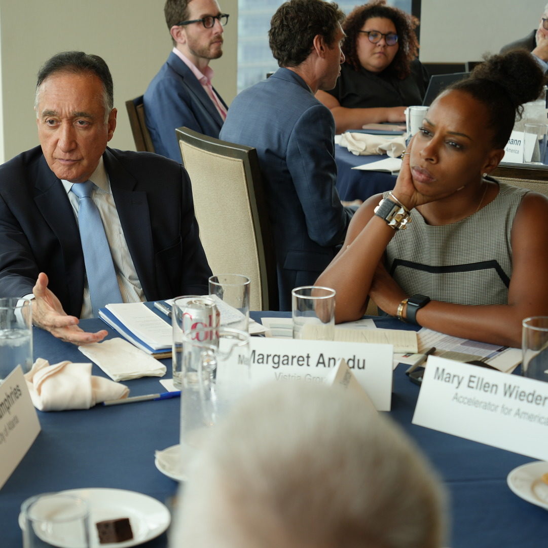 Teamwork taking place at a round table