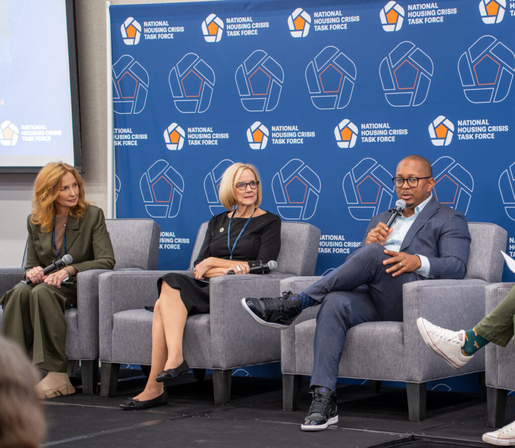 Caption: (Left to right) Moderator Sarah Dusseault, Mayor Eileen Higgins, Mayor Rex Richardson, and Mayor Matt Tuerk share ideas at the Mayoral Panel