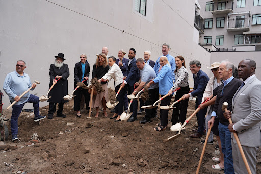 Task Force Member RuthAnne Visnauskas, third from left, joins the groundbreaking at Bartlett Crossing in Brooklyn's Broadway Triangle neighborhood.